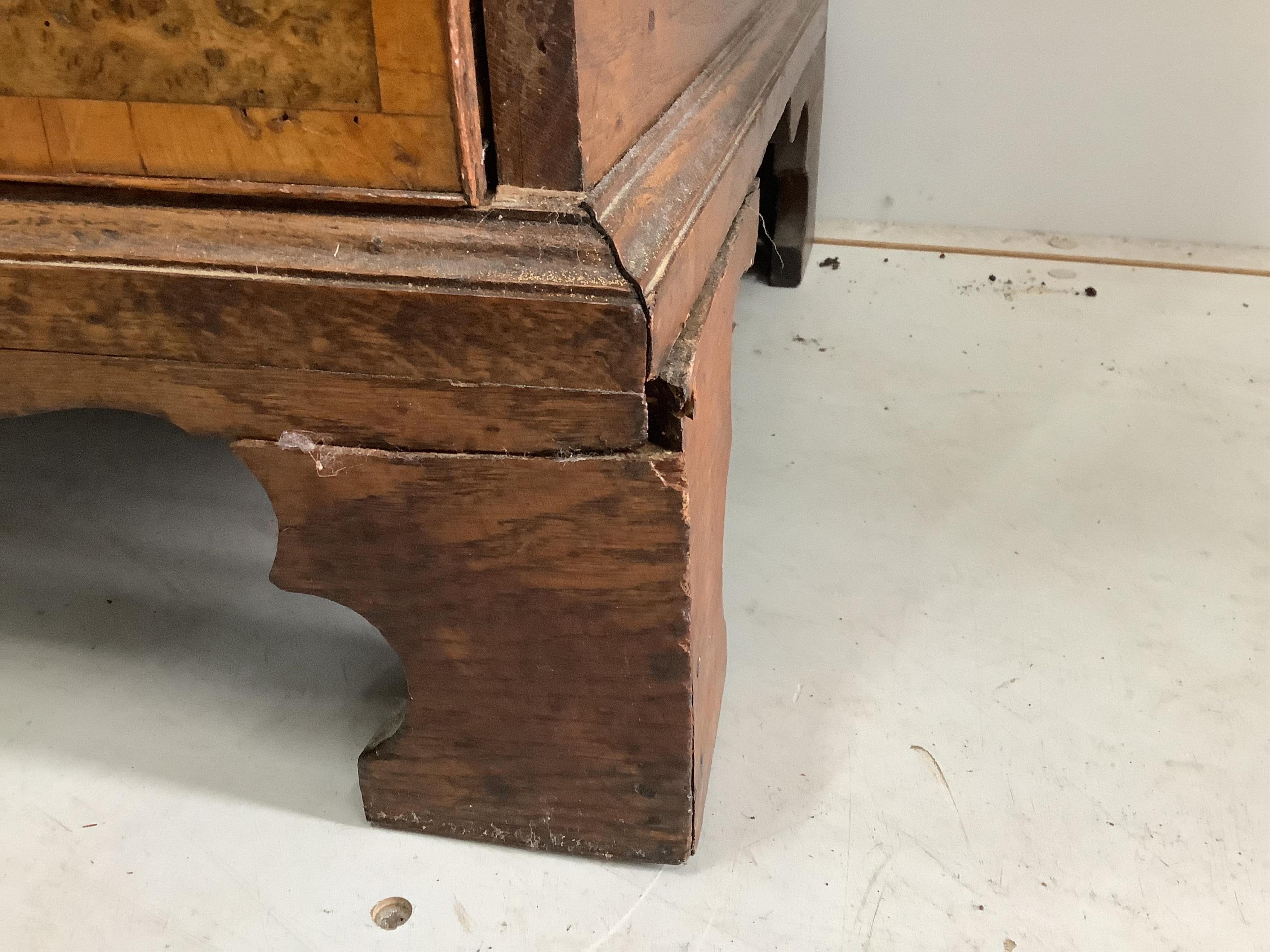 A mid 18th century and later crossbanded walnut and oak chest, width 95cm, height 103cm. Condition - poor